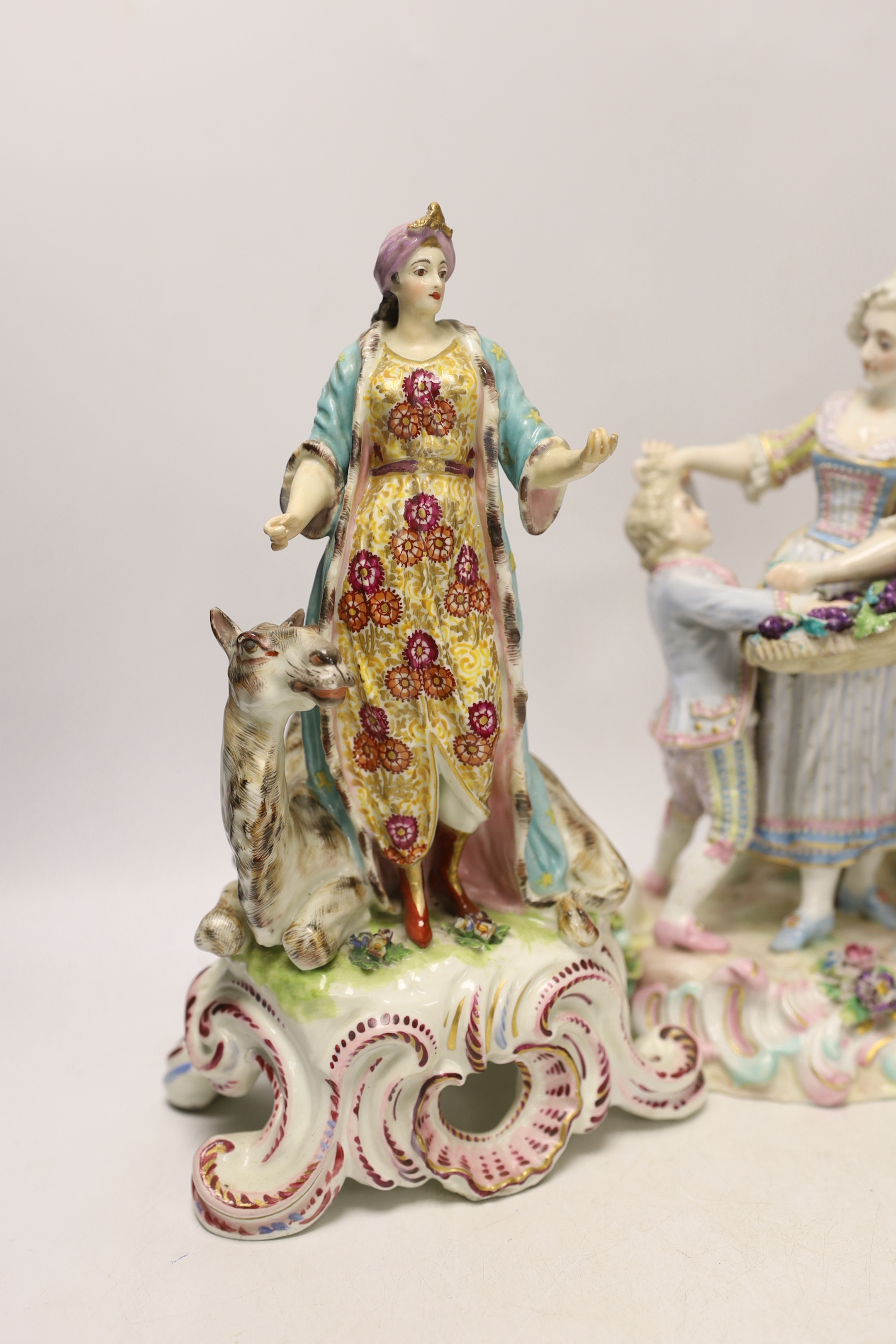 Three 19th century Continental porcelain figure groups, largest 27cm high, to emblematic of two of the continents